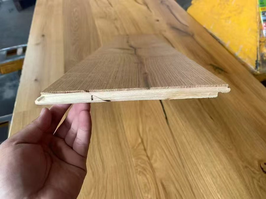 Custom teak flooring cross-section — solid wood structure and craft details